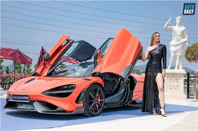 Xem hình ảnh đẹp thiếu nữ váy đen bên siêu xe sang trọng