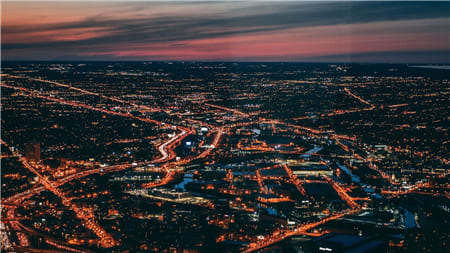 Hình ảnh thành phố về đêm nhìn từ ngoài không gian làm hình nền máy tính