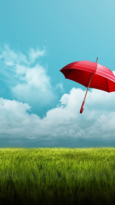 Hình ảnh chiếc ô màu đỏ bay lơ lững trên bầu trời làm hình nền điện thoại